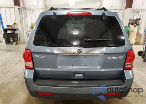 2010 Mazda Tribute I z USA, uszkodzony, nr VIN 4F2CY0C76AKM06448